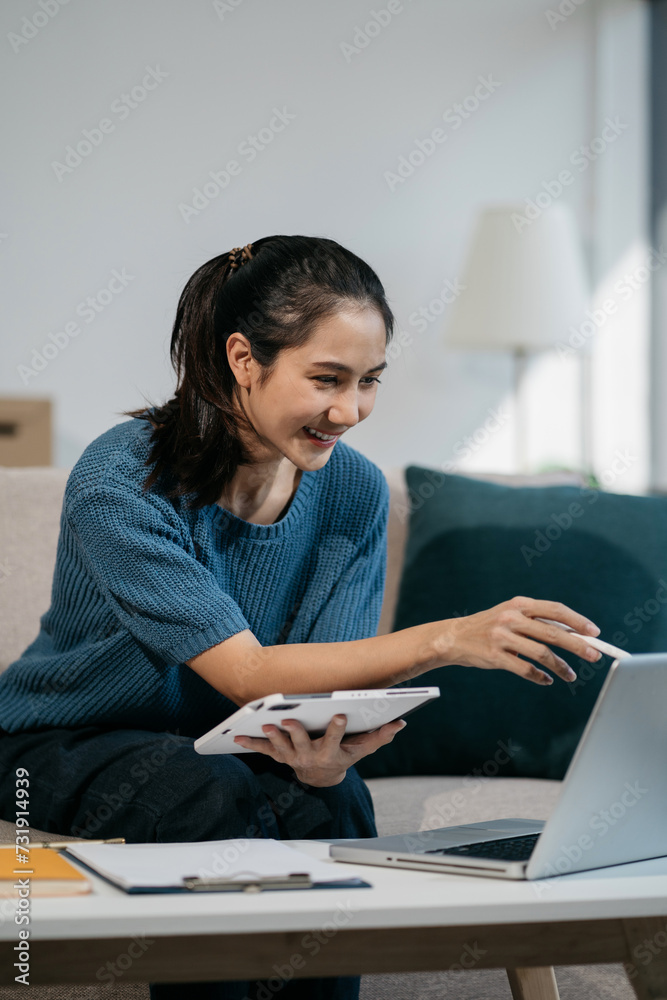 Concept of selling products online.entrepreneur or freelance checking orders from customers, woman runs an e-commerce business on websites and social media. Concept of selling products online.entrepreneur or freelance checking orders from customers, woman runs an e-commerce business on websites and social media.