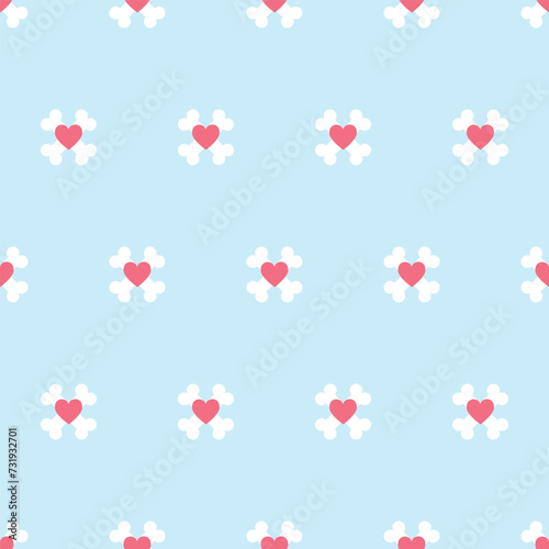 Seamless pattern of cross bones for dogs and hearts on a blue background
