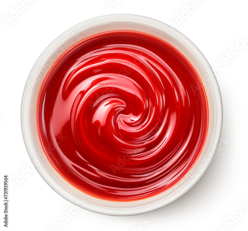Ketchup in bowl isolated on white background, top view