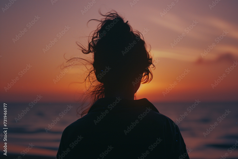 Fototapeta premium silhouette of a person on the beach