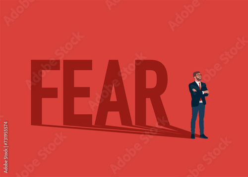 Businessman standing with shadow FEAR word. Overcoming fear concept. Flat vector illustration.