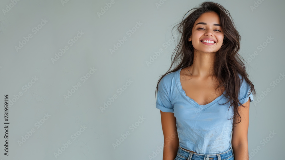 Indian woman wear blue t-shirt smile laugh out loud isolated Indian woman wear blue t-shirt smile laugh out loud isolated