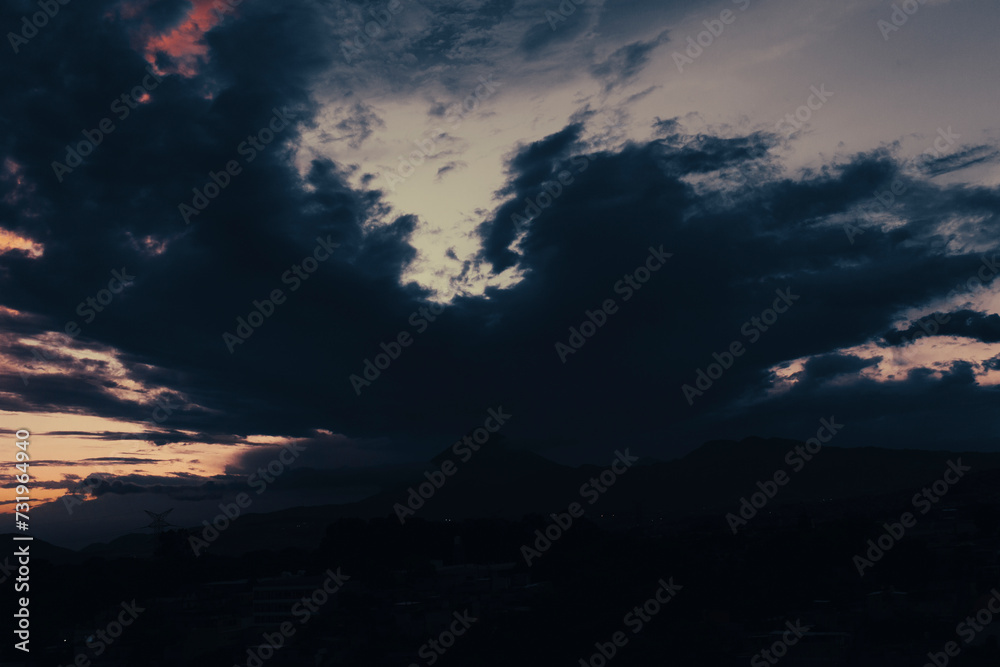 dark and cloudy sky at sunset, background of Guatemala volcano in storm