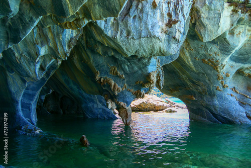 Sculpted blue Marble caves or Cuevas de Marmol at turquoise blue General Cerrerra Lake. Location Puerto Sanchez, Chile