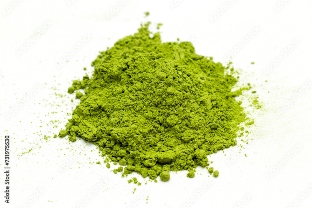 matcha green tea extract powder isolated white background