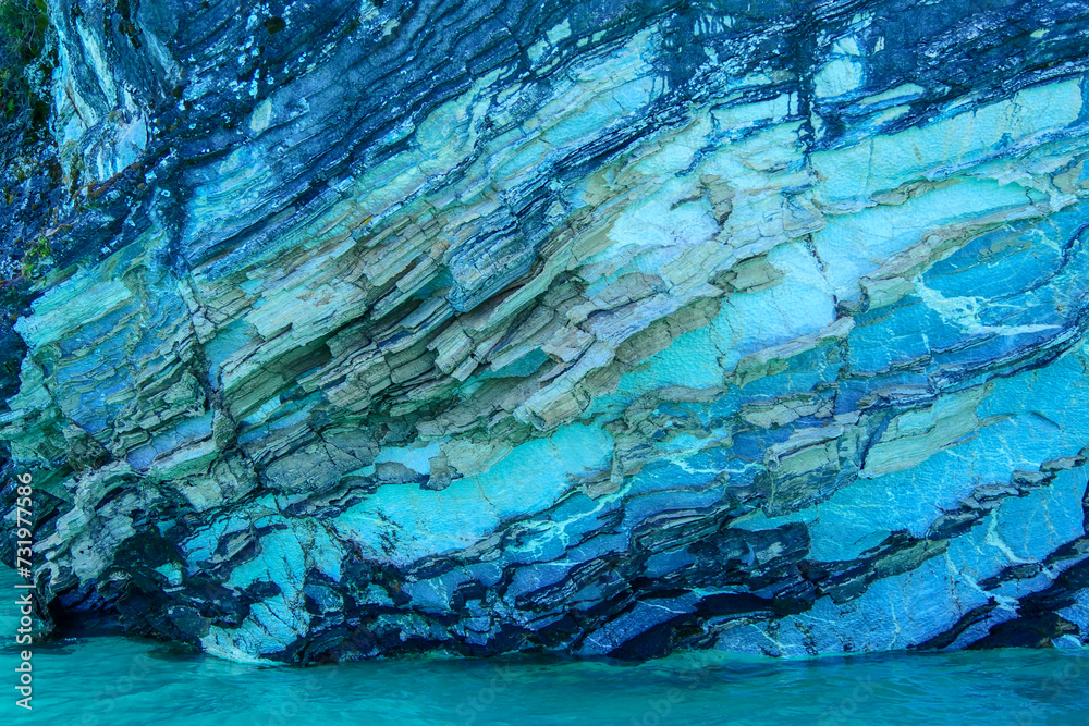 Detail of different colors of blue  and turquoise at the Marble caves or Cuevas de Marmol at turquoise General Cerrerra Lake. Location Puerto Sanchez, Chile