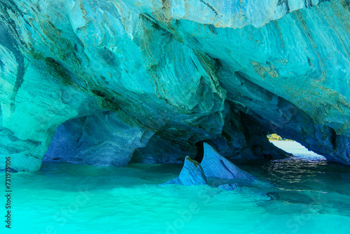 Sculpted turquoise blue chapels of Marble caves or Cuevas de Marmol at turquoise General Cerrerra Lake. Location Puerto Sanchez, Chile