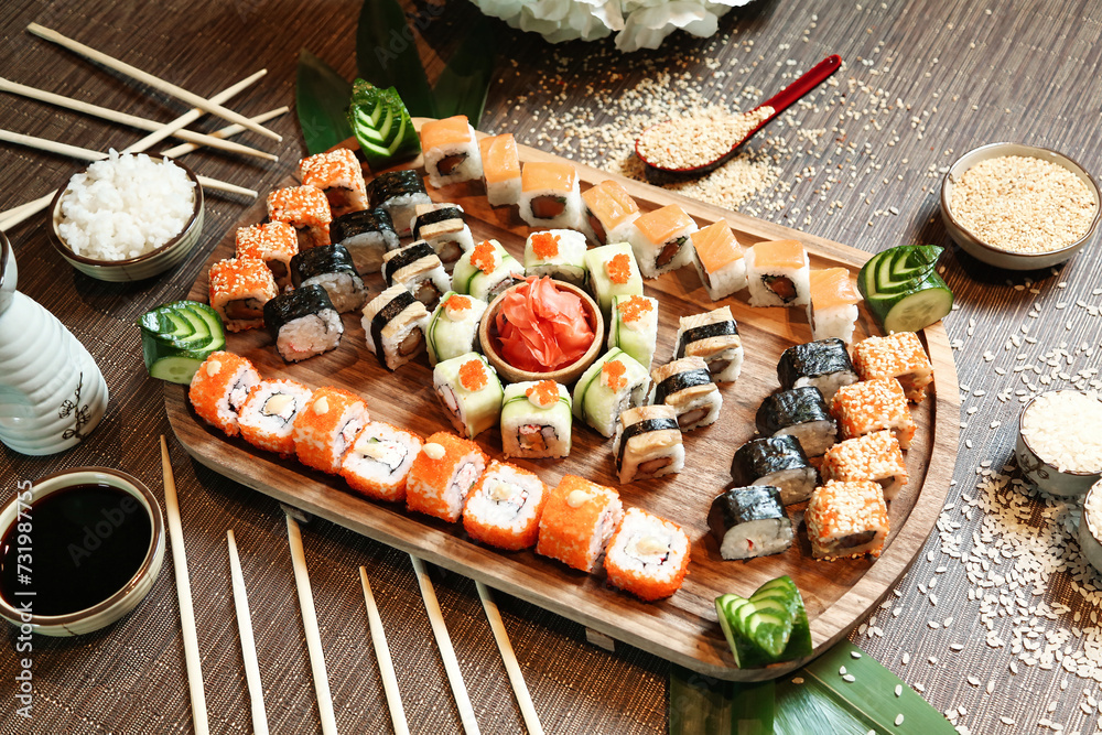 Wooden Tray With Sushi and Chopsticks Wooden Tray With Sushi and Chopsticks