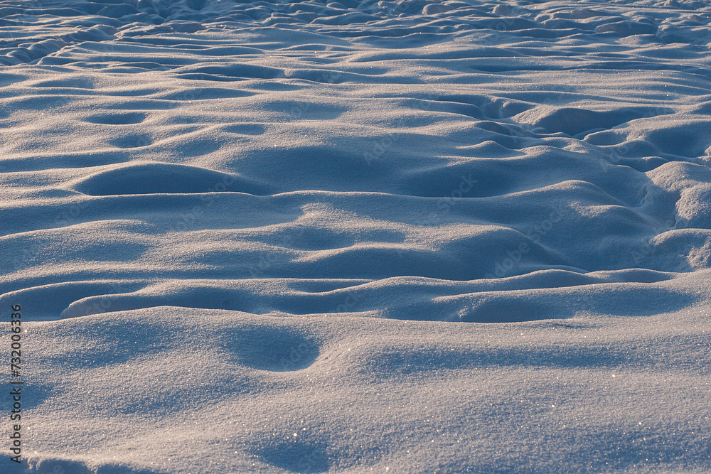 Shiny surface of snow in sunny weather. Shiny surface of snow in sunny weather.