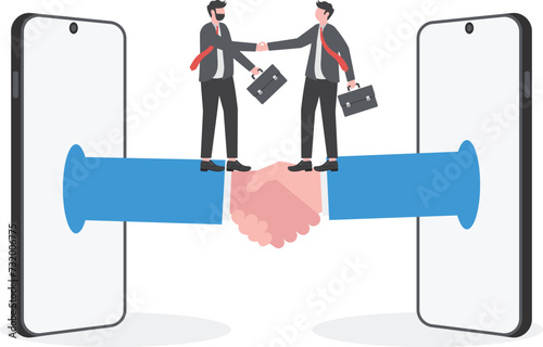 Hand shake and contract business. Business people shake hands through the phone screen,The concept of business communications.

