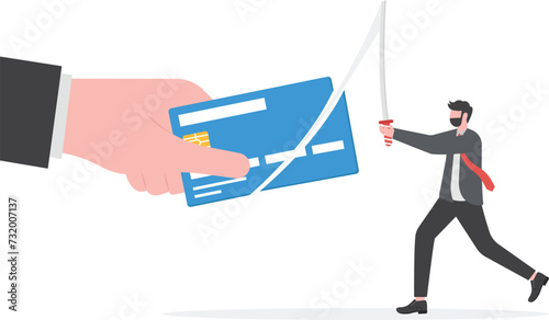 Credit card cutting. businessman using knife to cut credit card,destruction concept

