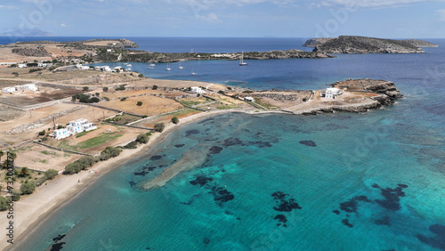 Fototapeta Naklejka Na Ścianę i Meble -  Aerial drone photo of paradise beach of Tsigouri and heart shaped small islet of Plaka, Schoinousa, Small Cyclades, Greece