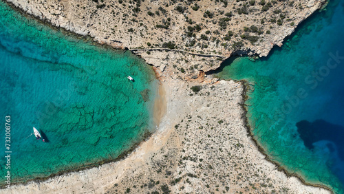Aerial drone photo of paradise secluded beach of Feidoussa in small isled of Ofeidousa only accessible by boat next to Schoinousa island, Small Cyclades, Greece