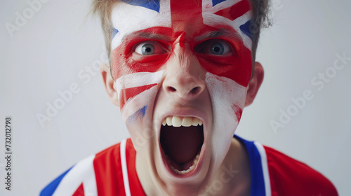 United Kingdom flag face paint, Close-up of a person's face, symbolizing patriotism or sports fandom.