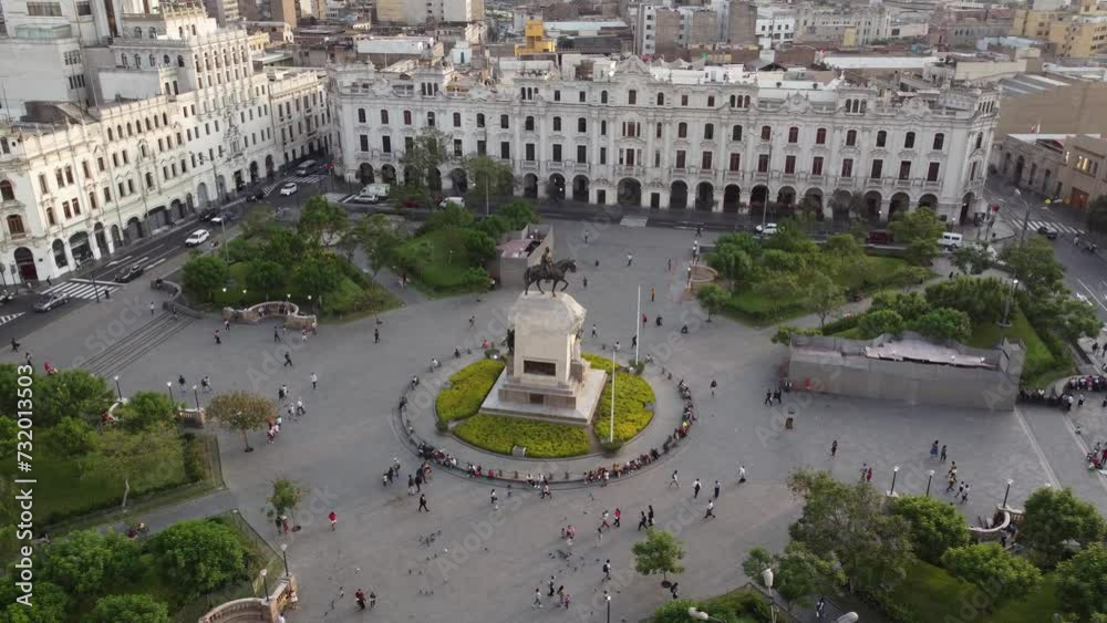 Aerial view of San Martin square with monument. Tourists and people gathered at Plaza San Martin in the historic center of Lima capital of Peru