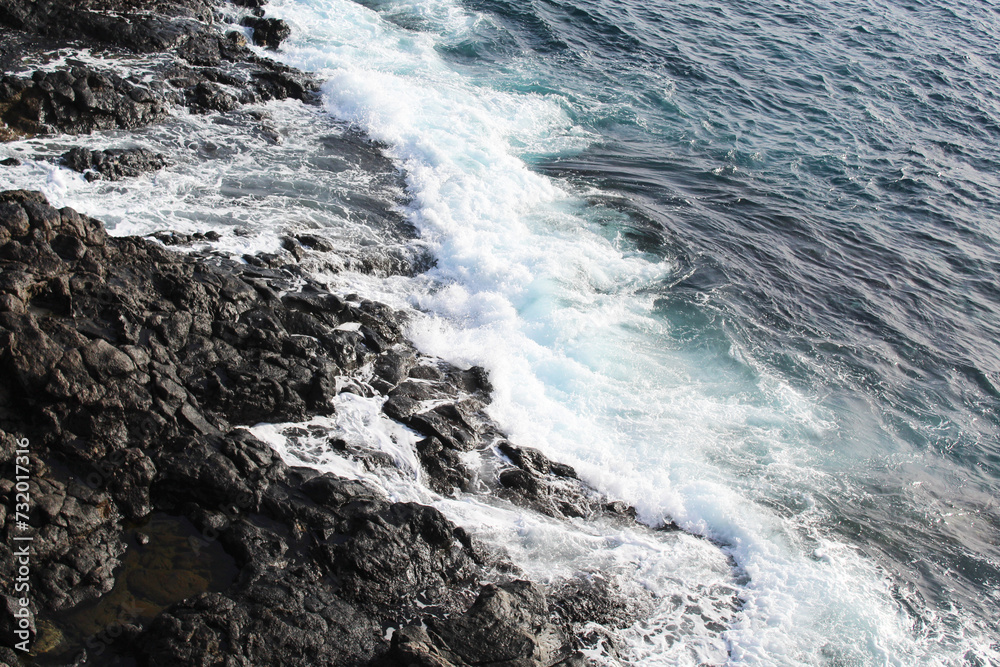  blue ocean waves on the rocks