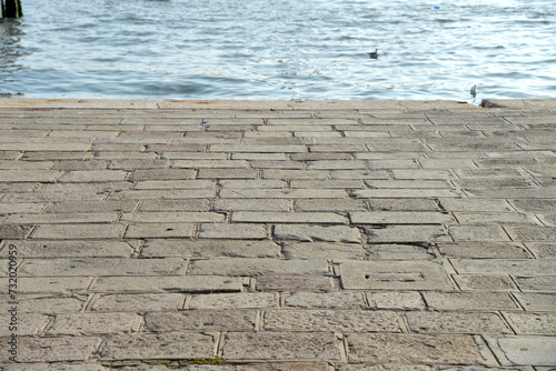 The Stone Venetian embankment closeup photo