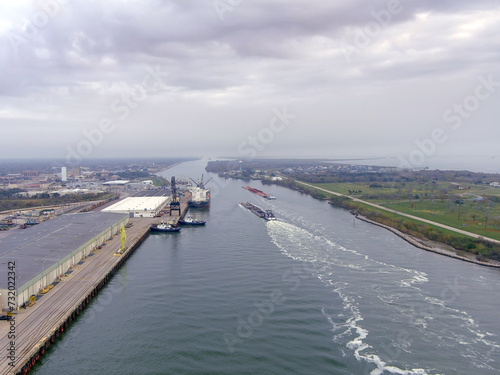 Aerial view of Tugboats and Barges on the Sabine Lake Causeway in Port Arthur Texas
