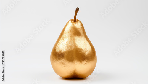 Golden pear on a white background