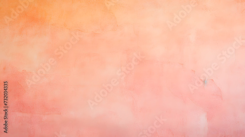 A pastel pink and orange stucco wall background with an abstract delicate pink backdrop. The rough artistic surface plaster texture creates a beautiful vintage wallpaper with copy space