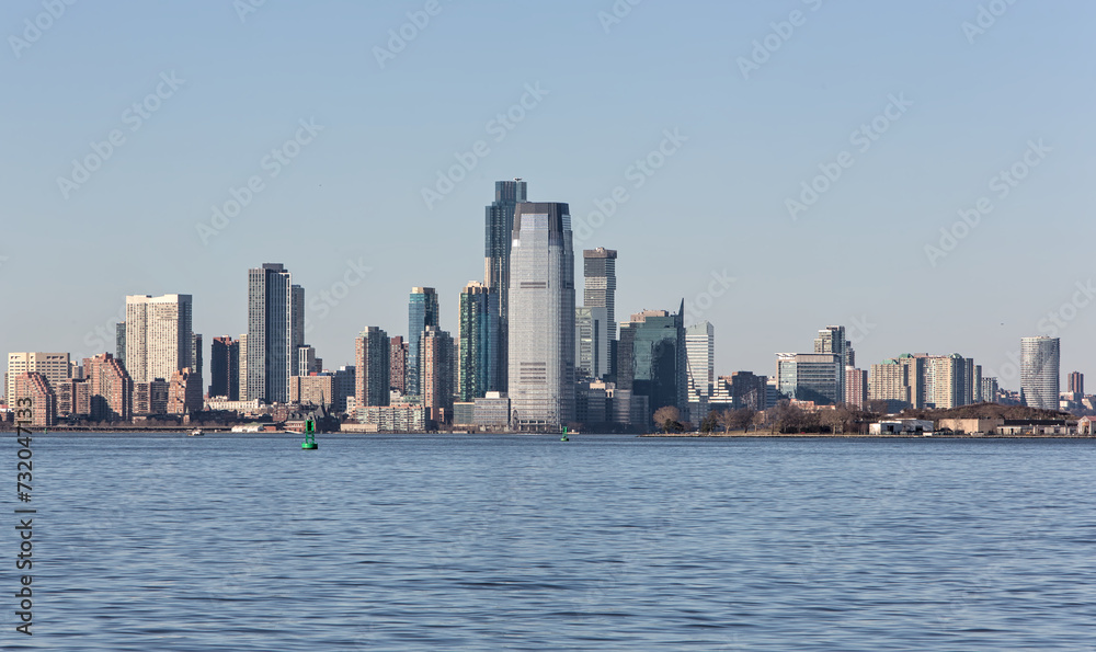 downtown jersey city nj view (tall buildings on the waterfront with hudson river in the foreground) new jersey downtown jersey city nj view (tall buildings on the waterfront with hudson river in the foreground) new jersey