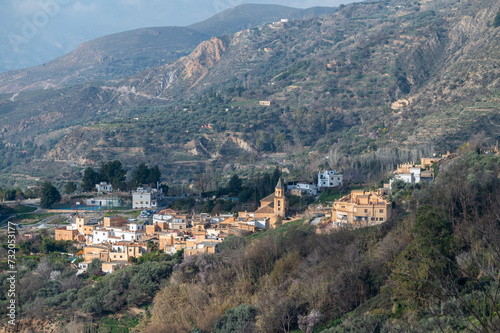 Top view of Carataunas  a town in the Alpujarra of Granada  between mountains