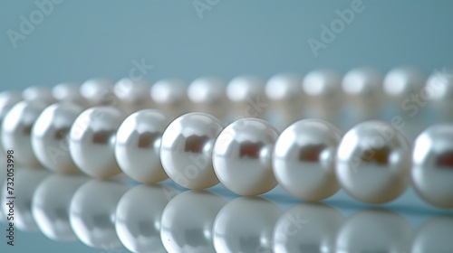 Symmetrically arranged pearl beads on a minimalist background