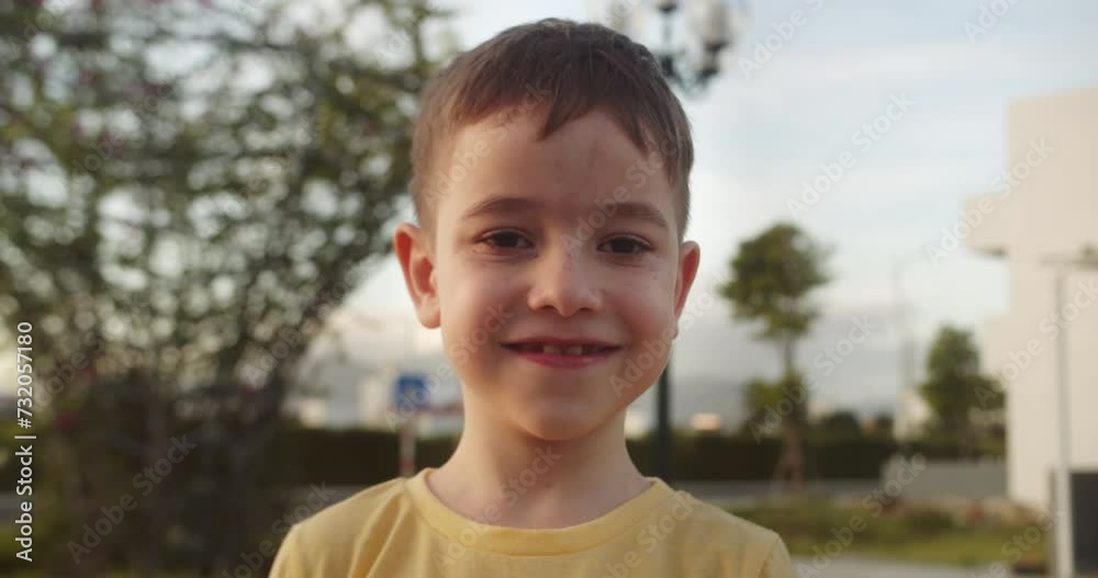 Cute child happy facial expression emotion glad smiling face. Portrait Funny kid little boy smiling child looking a t camera. Pretty face child. Concept of a happy childhood. 4K Cute child happy facial expression emotion glad smiling face. Portrait Funny kid little boy smiling child looking a t camera. Pretty face child. Concept of a happy childhood. 4K