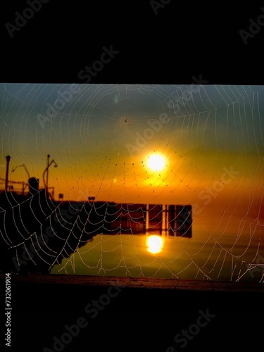 Tableau sur toile Sunrise from the spider web