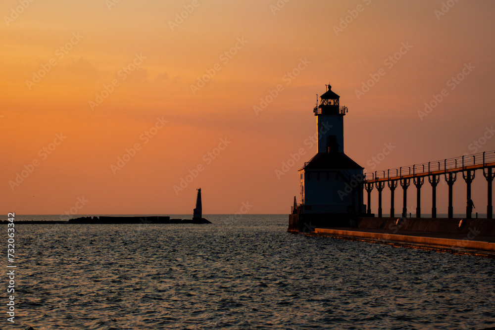 Lighthouse on a Lake at Sunset