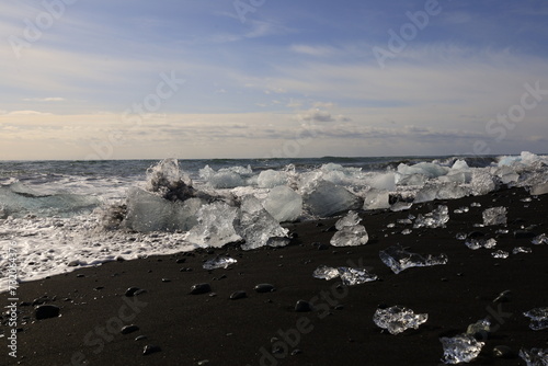 View on a iceberg on the Diamond Beach located south of the Vatnaj  kull glacier between the Vatnaj  kull National Park and the town of H  fn