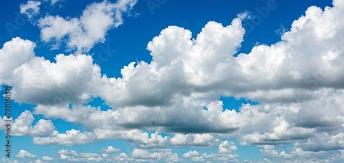 Blue sky with white clouds. Generative AI © POKPAK