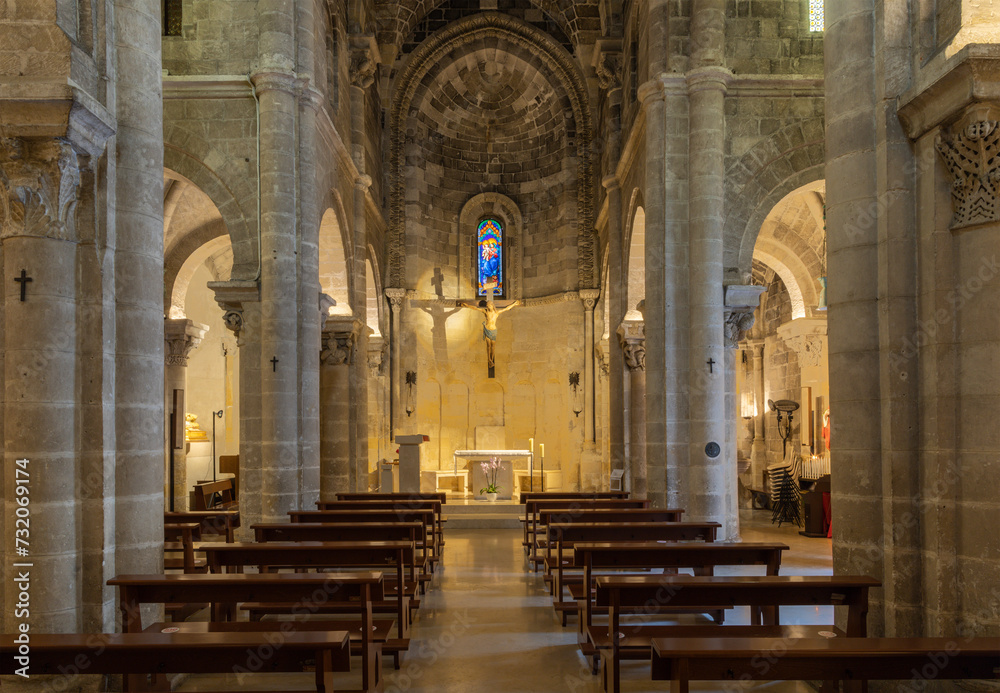MATERA, ITALY - MARCH 7, 2022: The nave of gothic church Chiesa di San Giovanni Battista.