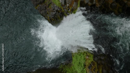 Huge waterfall in lush forest, Oregon.