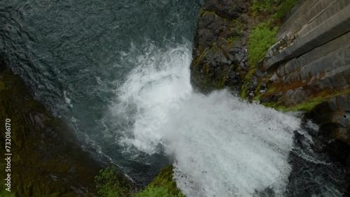Huge waterfall in lush forest, Oregon.