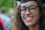 Joyful Young Woman Celebrating Graduation with Big Smile