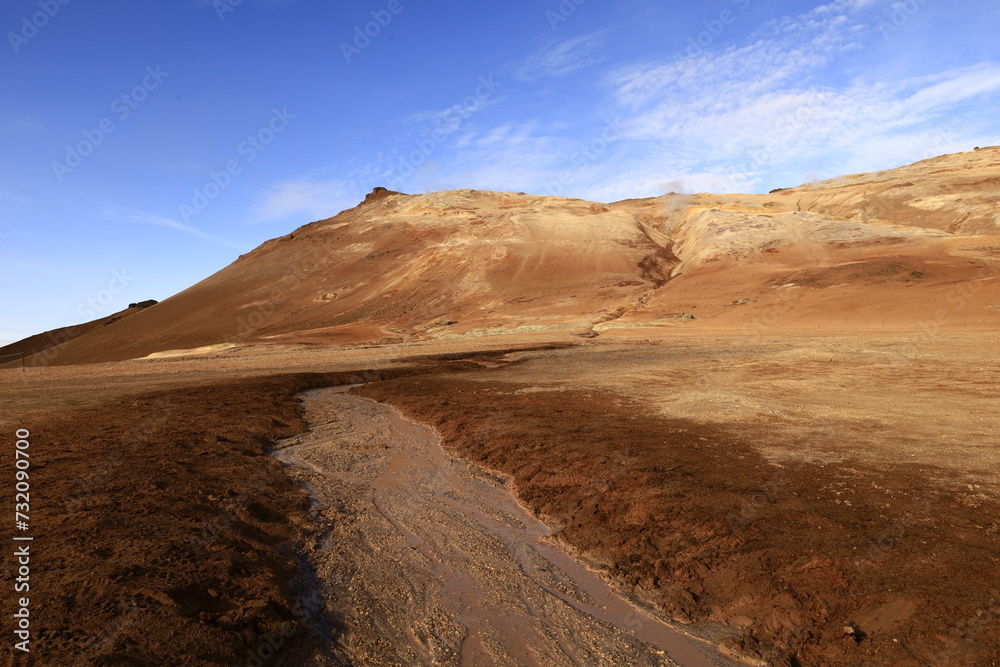 Naklejka premium Hverarönd is a hydrothermal site in Iceland with hot springs, fumaroles, mud ponds and very active solfatares. It is located in the north of Iceland