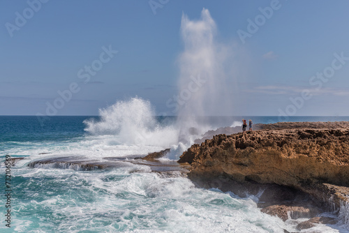 Quobba Blowholes (75km N of Carnarvon) spouting water - MacLeod, Western Australia
- caused by water being forced through sea caves by waves photo