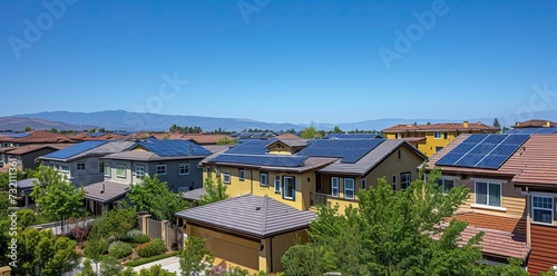 Renewable Energy Showcase: Residential Area with Solar-Clad Roofs and Blue Sky © Irfanan