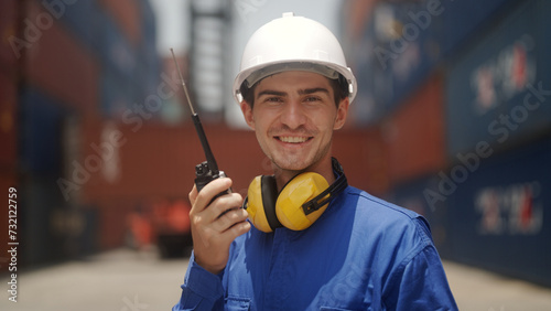 Portrait of happy and smiling worker at dock