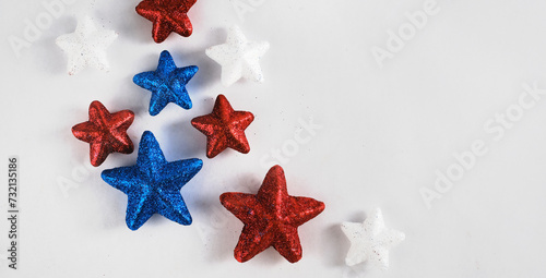 4th of July background with glitter stars in red white and blue, copy space on background for holiday.