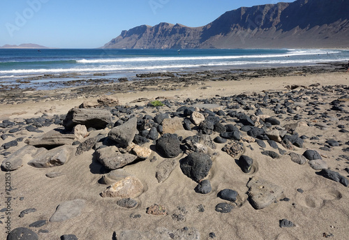 Landscape of the wild surf beach Famara in the north west of Lanzarote photo