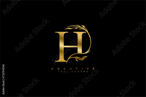 luxury gold letter H logo design with beautiful flower and leaf ornaments. monogram H, logo typography. initials H. typography. for business logos, boutiques, companies, beauty, etc