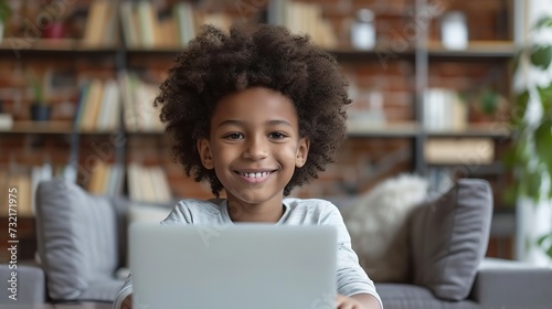 A black little kid doing online class in laptop with empty space, Generative AI. photo
