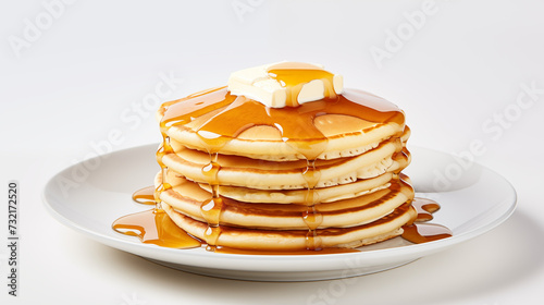 Classic American Dessert Pancakes With Butter and Drizzled With Syrup