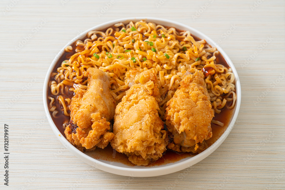 Korean instant noodles with fried chicken or Fried chicken ramyeon Korean instant noodles with fried chicken or Fried chicken ramyeon