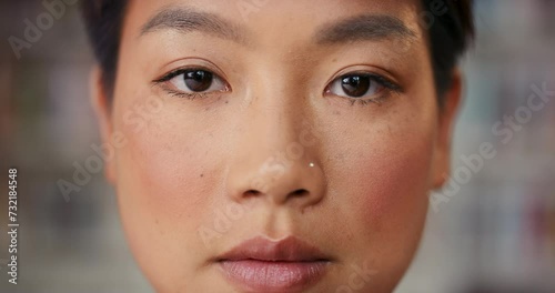 Serious, beauty and face of confident Asian woman for vision, perception and awareness. Facial expression, humanity and closeup portrait of person stare with pride, emotion and observe in Hong Kong photo