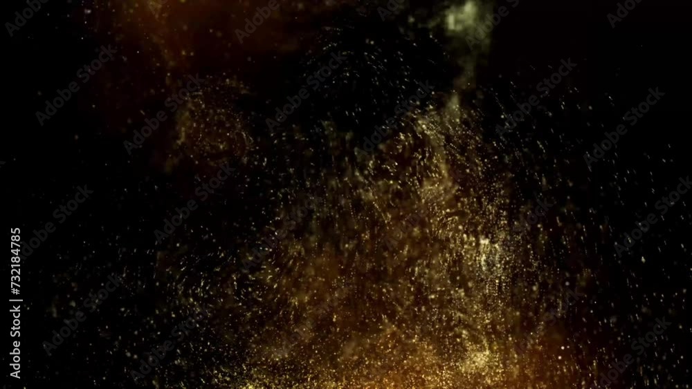 Golden glitter background in slow motion. Beautiful transition with real gold particles flying in wind on black background, shot with depth of field. Gold dust bokeh abstract background Golden glitter background in slow motion. Beautiful transition with real gold particles flying in wind on black background, shot with depth of field. Gold dust bokeh abstract background