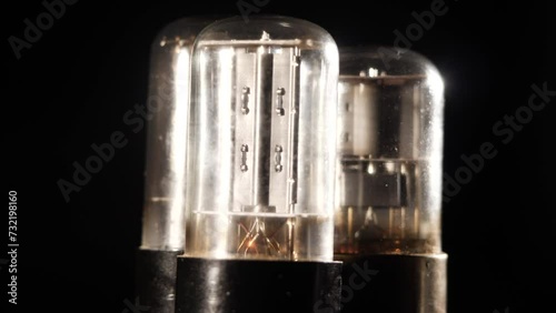 Three spinning vacuum tubes