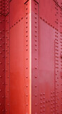 Golden Gate Bridge San Francisco: Close-up details of the nuts and bolts and steel metal sheets building material used to construct the bridge. 